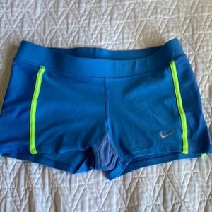Blue and neon green nike shorts